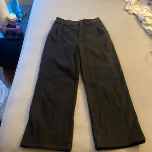 Black flared thick work pants.